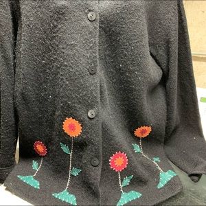 Black sweater with appliqué flowers